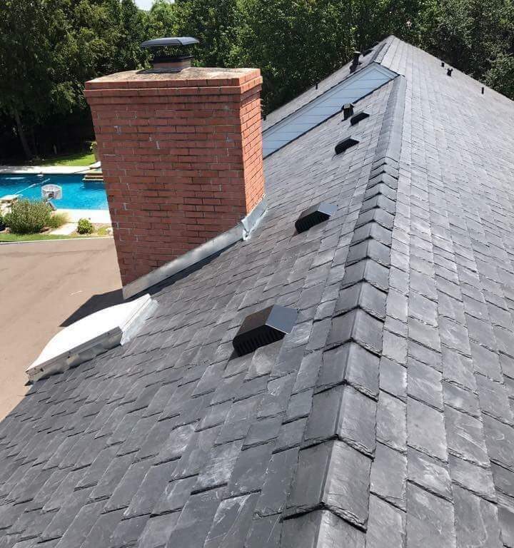 Berthoud, Colorado roofing contractor installing synthetic shingles