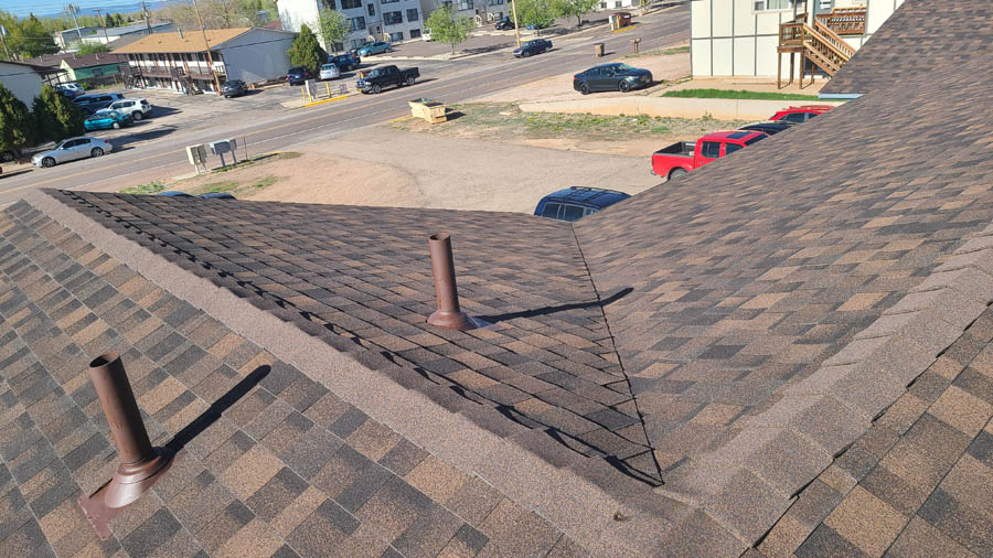 Brush roofing company installing asphalt shingles