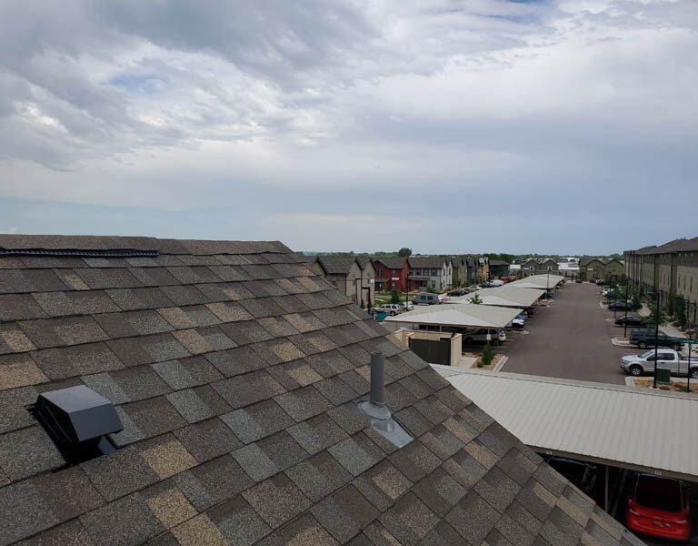 Wellington colorado roofing contractor completing roof replacement in wellington colorado