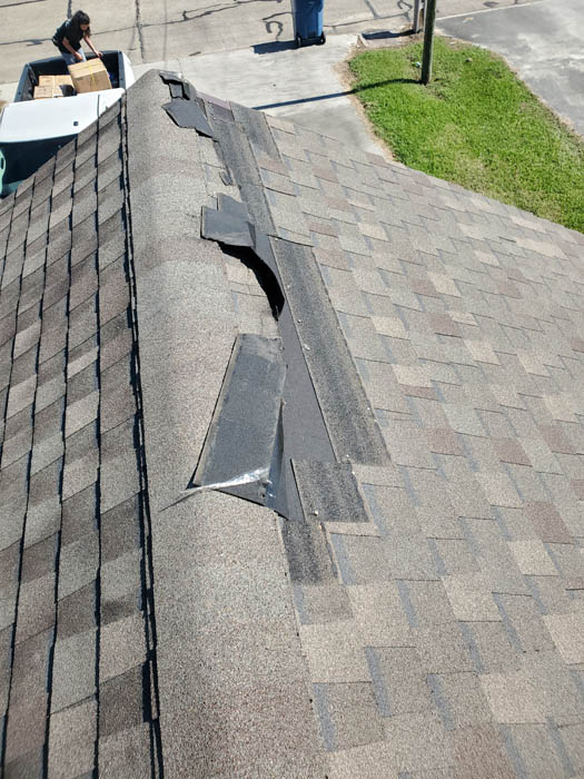 Wind damage roof repair