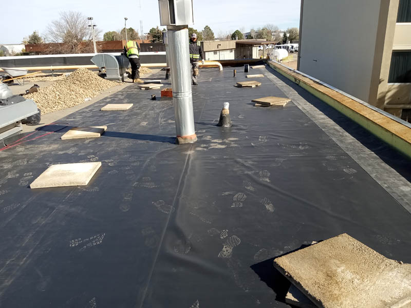 Commercial roofing company in Firestone Colorado replacing flat roof