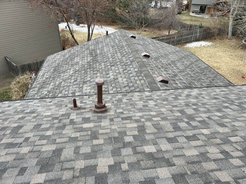 Fredrick roofing company completing a roof replacement with asphalt shingles