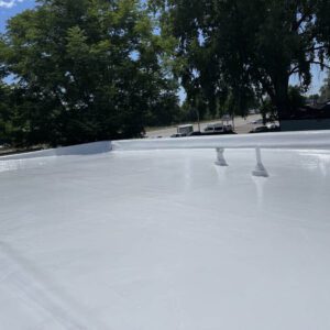Commercial roof coating by commercial roofing contractor in Greeley